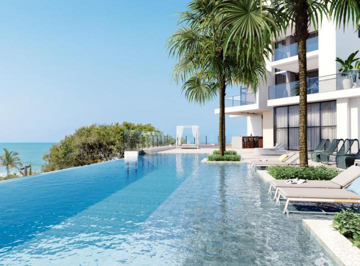 Fachada com piscina · Apartamento Penha SC - Coral Gables