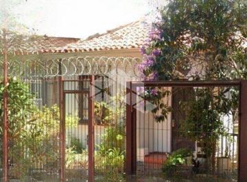 01 · Casa térrea com 02 quartos  na Rua Humberto de campos, Partenon