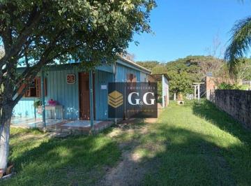 3becc9585379d0be40e14c5e24cda0ec9475020f · Casa bem localizada em Itapuã RS