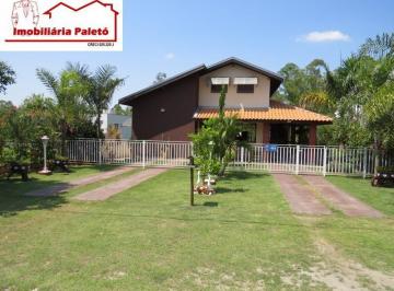 Foto 02 · Casa de campo no Ninho Verde I, excelente localização