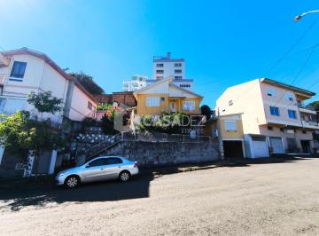 FACHADA · TERRENO COM 4 MORADIAS