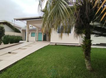 Foto 01 · Casa com 3 quartos com uma suíte no Centro