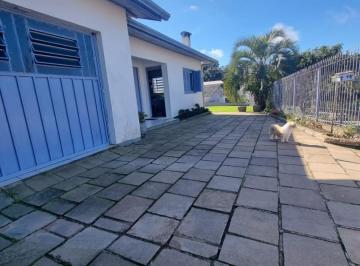 Casa · 140m² · 4 Quartos · 2 Vagas · Casa à venda terreno plano no bairro Bela Vista - 4 dormitórios, churrasqueira e suíte!