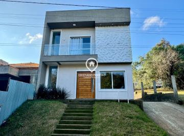 Casa · 110m² · 3 Quartos · 2 Vagas · Sobrado com 03 dormitórios sendo 01 suítes à venda no bairro Villa Lucchesi- Gravataí/RS