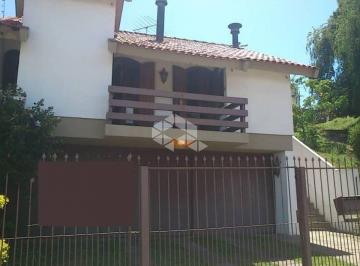 284307_iw4W76_284307641de907ac691.jpg · Casa 4 dormitórios com vaga de garagem no Bairro Jardim Lindóia.