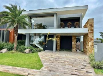 Casa · 255m² · 4 Quartos · 2 Vagas · Casa condomínio nova com 04 suítes mobiliada e decorada