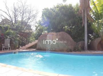 1cecaecf063a447e415309e8dd9a753c35530752 · Excelente Casa com muito Verde, Piscina e um paisagismo encantador no Condomínio Horizonte Azul I - 