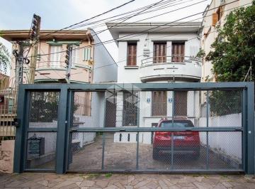 ce9f5a74-3d3e-486b-b3ee-429a3794c549 · Casa de 4 dormitórios, 2 vagas de garagem, no bairro Rio Branco, em Porto Alegre/RS.