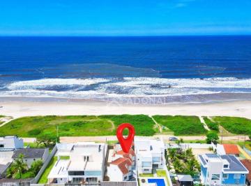 a02ef964ba38fc22c87204da53d6a774a53d99e8 · Sobrado em Condomínio de Frente para o Mar, com 3 dormitórios à venda, 108 m² por R$ 700.000 - Coroa