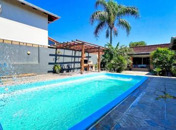 81293322824d0f9a788bee096a930b9fc1de29a5 · Casa com 4 dormitórios à venda, 142 m² por R$ 890.000,00 - Brejatuba - Guaratuba/PR