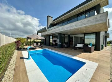 505006_i9688tmzCohJI848CBVo1_50500665cceee0e82ff.jpg · Casa com 350 M², 05 Suítes, mobiliada e decorada com piscina em Capão Novo