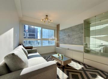 Apartamento · 75m² · 2 Quartos · 1 Vaga · Apartamento à venda no bairro Navegantes, Capão da Canoa, 2 dormitórios (1 suíte), 92m² privativos
