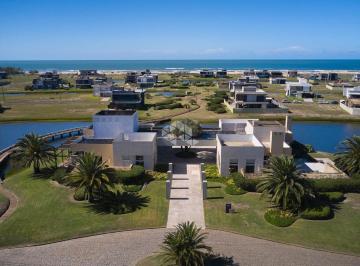 262697_i9TT53J1_262697656cbe298699d.jpg · lote beira lago, no Condomínio Costa Serena, Capão da Canoa/RS