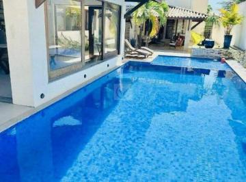 Casa · 318m² · 4 Quartos · 10 Vagas · Seu Refúgio Exclusivo no Morada do Rio