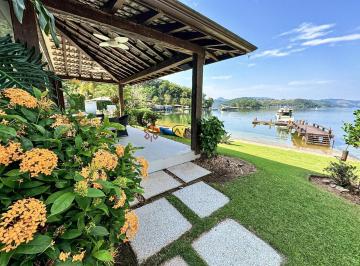 Casa · 603m² · 6 Quartos · 3 Vagas · Linda mansão pé na areia com piscina em cond. de luxo