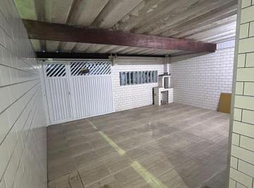 pcbjinq2odewy2vknmm1mdji_md · Casa com quintal a venda no Tude Bastos - 2 dormitórios.