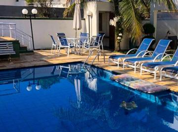 Casa · 450m² · 6 Quartos · 4 Vagas · Casa à venda no Condominio Jardim Acapulco na praia do Guarujá.