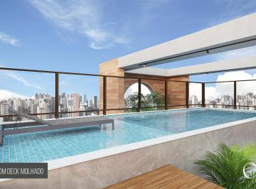 Piscina com Deck Molhado · Área Privativa de 102m² – 2 suítes, varanda gourmet e lavabo. Lazer no rooftop