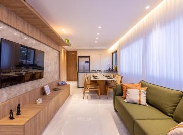 Sala · Apartamento de 71,4m² – 2 suítes, varanda gourmet. Lazer no rooftop