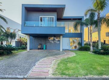 640895_id3q9_64089566d30b841a559.jpg · Sobrado beira-lago com 4 suítes, totalmente mobiliado, com piscina e área gourmet no condomínio fech
