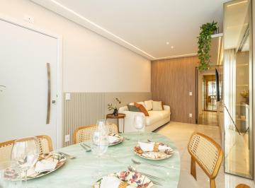 Sala · Apartamento tipo de 71,5m² - 2 quartos, 2 suítes, closet e varanda gourmet.