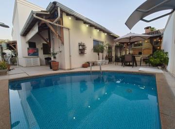9776e00167344b7abacb5a5d732098bb.jpeg · Casa para Venda em Uberlândia/MG - 3 Dorm. 190 m2 Área Útil