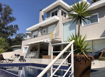 Casa · 561m² · 4 Quartos · 4 Vagas · Casa à venda em Alphaville com 4 suítes, sauna e vista panorâmica para a mata