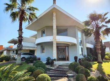 Casa · 440m² · 5 Quartos · 2 Vagas · Elegante e Luxuosa residência com 5 suítes condomínio exclusivo de alto padrão.