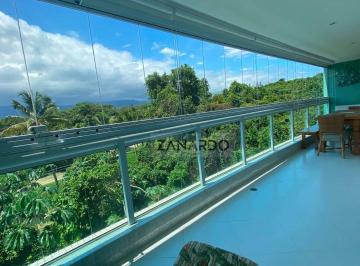 Varanda · Apartamento em Riviera de São Lourenço