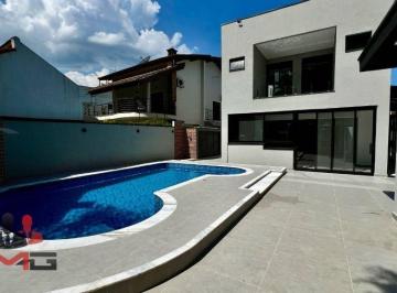 64daf6065799a6ed7d505b9bc2458d50f1416ff7 · Casa com 6 dormitórios à venda, 309 m² por R$ 4.800.000,00 - Riviera - Módulo 30 - Bertioga/SP