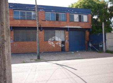 53774_53774_117682.jpg · Dois depósitos, no bairro Navegantes, rua Frederico Mentz, medindo 2.634,00m2 e 1.252,50 m2