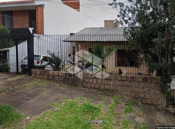 134793_i39tv9gX65478Z87_1347935feccc20dc2b9.jpg · Casa à venda com 2 Dormitórios em amplo Terreno no Bairro Jardim do Salso em Porto Alegre / RS.