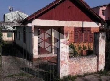 517508_ip98yzZ8Ui_517508660f3e9ad86dd.jpg · Terreno amplo com duas casas e kitnet no bairro Camaquã!