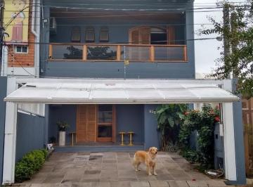94493_iBsj5Y_944935d35d345c73bd.jpg · Casa com 3 dormitórios/quartos no bairro Partenon