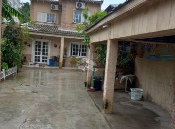423728_i278U3pduY0_42372864b05811bba54.jpg · Casa 3 dormitórios, terreno amplo para uso fins comerciais ou residenciais para venda no bairro Rio 