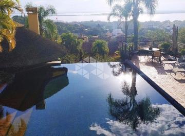 124738_i39ae_1247385ef395fce8503.jpg · Casa Alto Padrão em condomínio fechado com vista para Guaíba!