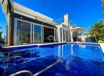 246301_if7Co6S2Yp13m2U9P_24630165c621e4e4f7c.jpg · Casa em condomínio semimobiliada de 3 suítes, escritório, possui pátio, piscina e sauna, pode ser f