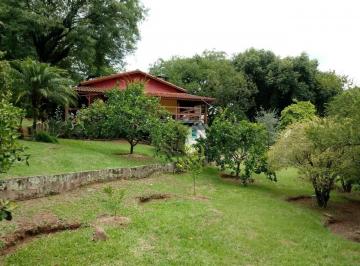 3fac12d0c3d97704feebfd0df7b9ee1027e0596d · Sítio com 100.000 m² de área, casa avarandada com 3 dormitórios, sendo 1 suíte à venda, 100000 m² po