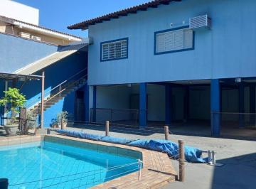 Casa · 420m² · 3 Quartos · 7 Vagas · Casa à Venda no Village Flamboyant – Cuiabá/MT com Espaço Gourmet e Piscina