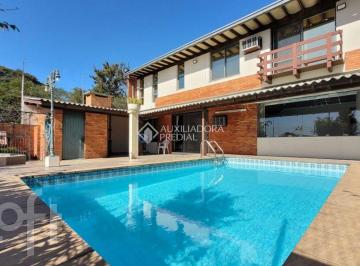 415174_iE12zv54pt79368_41517468b5cd8445c7f.jpg · "Maravilhosa Casa no Bairro Três Figueiras! com Piscina e  318m²