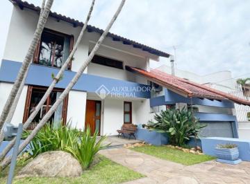 VENDA_CASA_BOAVISTA_PORTOALEGRE_FACHADA · EXCELENTE CASA NA BOA VISTA
