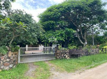 Casa · 215m² · 5 Quartos · 4 Vagas · Excelente oportunidade de uma casa  com 05 suítes ,muito bem localizada na Praia do Rosa