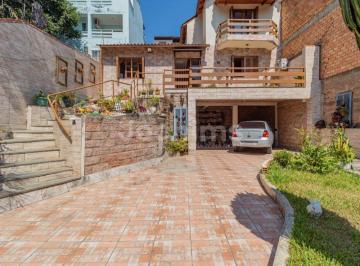 Casa · 165m² · 3 Quartos · 4 Vagas · Casa à venda em Porto Alegre/RS