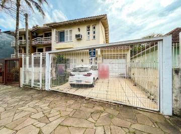 Casa · 260m² · 4 Quartos · 4 Vagas · Casa à venda em Porto Alegre/RS