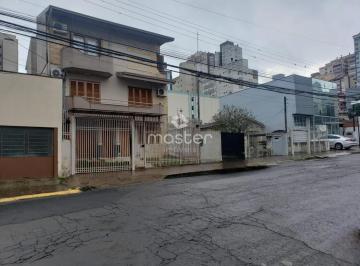 FACHADA · TERRENO NO CENTRO