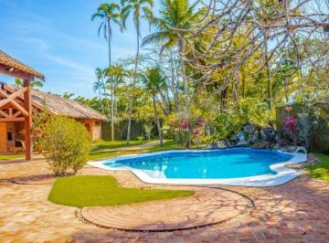 1bf34cc56902f9aaadc1639dae4d09c4685cf8c1 · Casa com 5 dormitórios à venda, 1050 m² por R$ 6.500.000,00 - Park Lane - Guarujá/SP