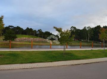 58634_iu764zP32l7Kc1F8Nn6HY_586345e7f655aa682f.jpg · Terreno plano com 1.003,00m² no Condomínio Fechado Laken, em Gramado