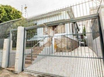258250_i477b25S9_258250638797e8ad6aa.jpg · Casa à venda com 5 quartos, 4 banheiros,  5 vagas de garagem, piscina, no bairro Santo Antônio, POA/