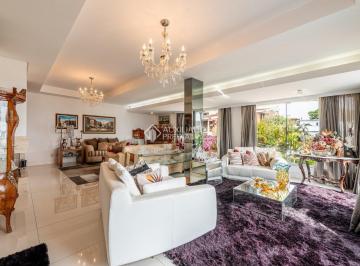 Casa · 546m² · 5 Quartos · 6 Vagas · Residência ampla e confortável em condomínio fechado com uma vista incrível para a cidade e Guaíba.