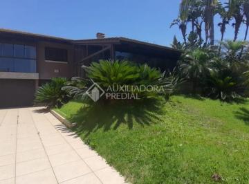 Casa · 222m² · 4 Quartos · 1 Vaga · Casa em Torres RS, com 4 dormitórios perto da praia!